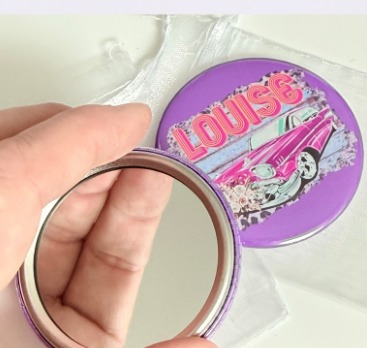 A personalised purple pocket mirror